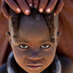 Himba little girl and mother - Angola