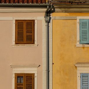 Pastel colored houses at Tartini's square in Piran